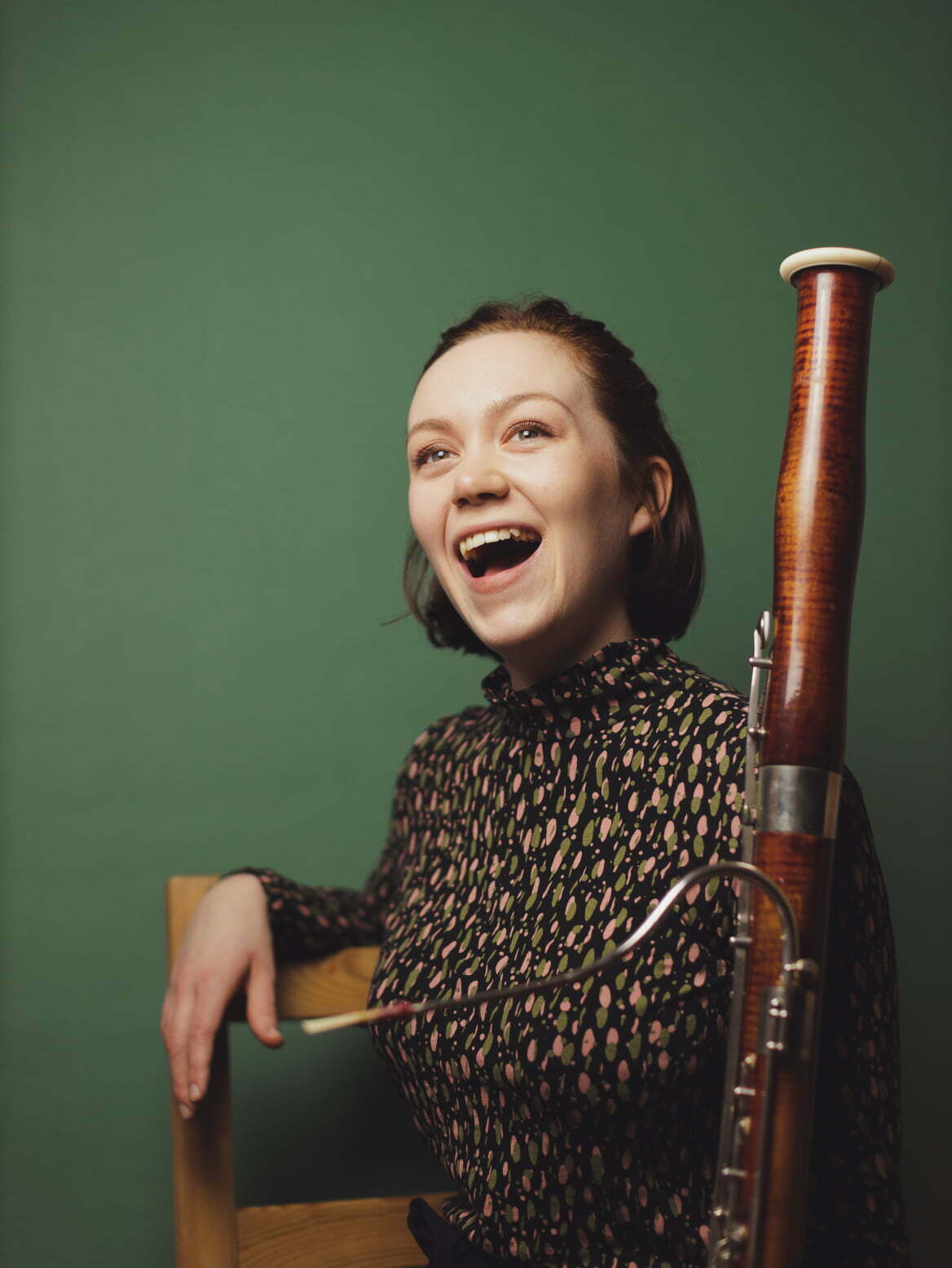 Holly Redshaw with bassoon headshot laughing